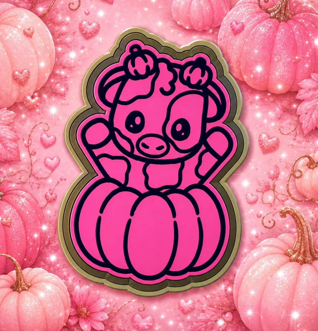 Cute cow inside a pumpkin