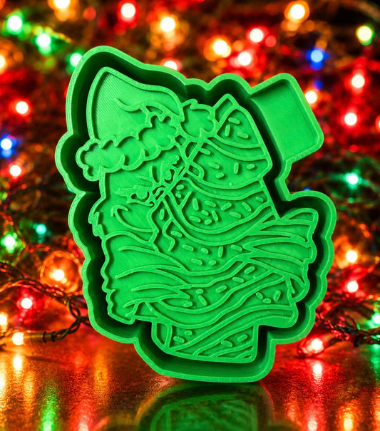 Green man holding tree cake