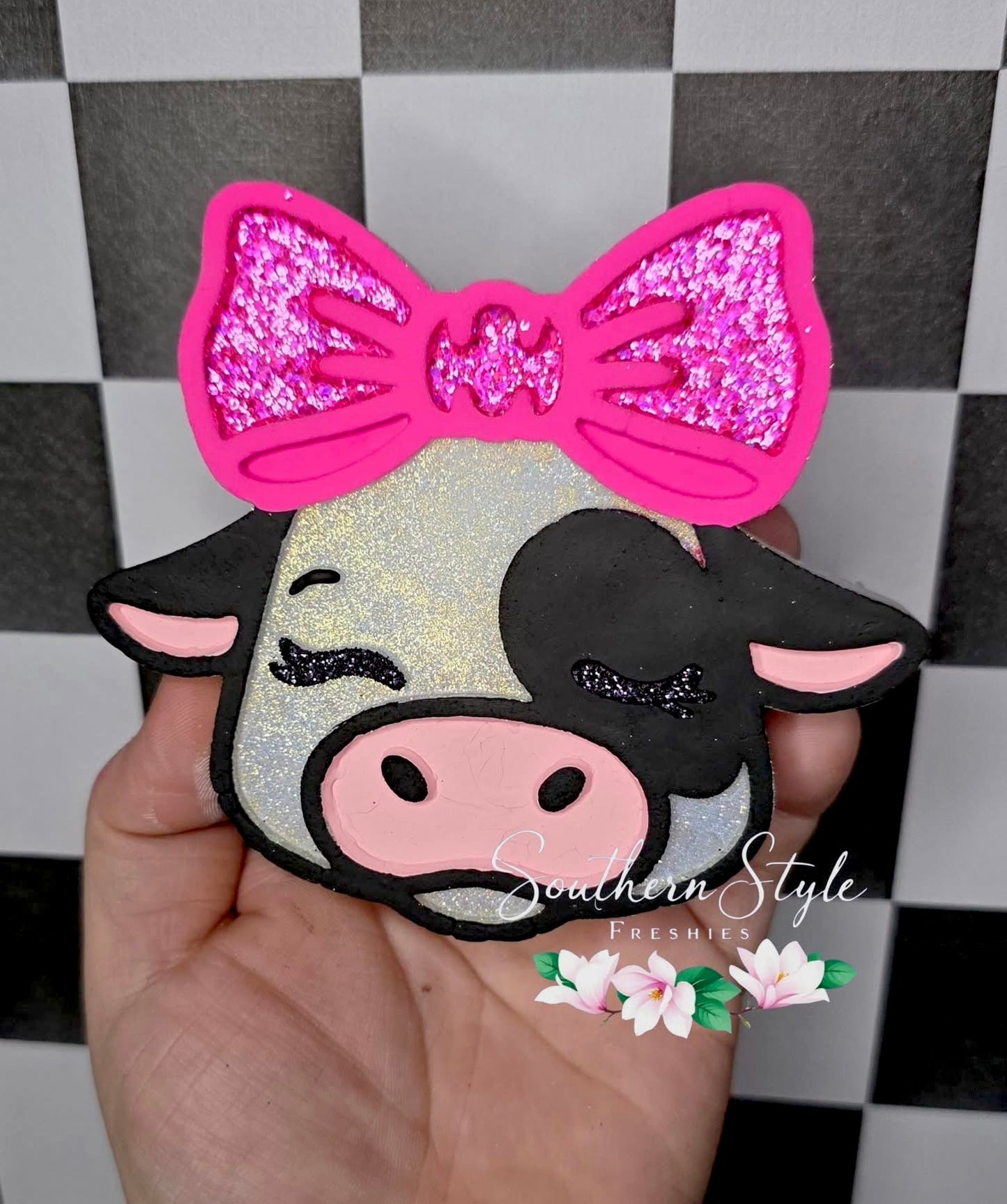Cow head with a bow