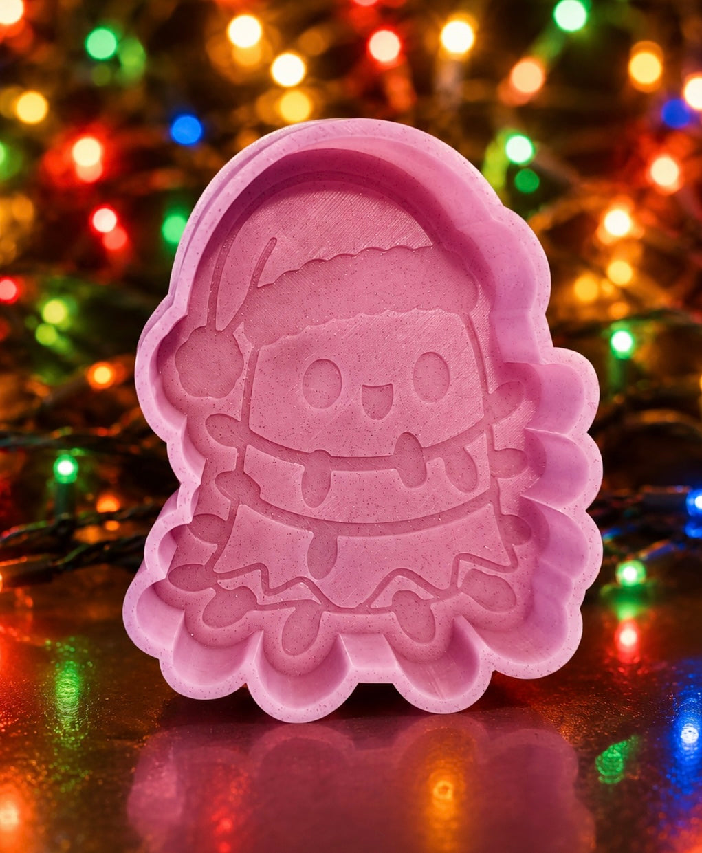 Cute ghost with Christmas lights wrapped around