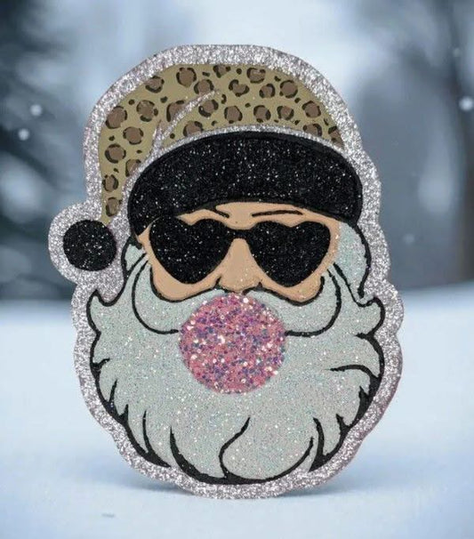 Santa blowing bubble gum